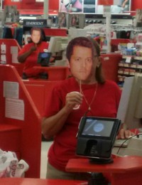 #25 Get all of the checkout employees at a supermarket to wear ''Mishacolypse'' masks as they ring up customers. They all must be working their individual registers when you take the picture. There must be a minimum of four checkout workers. The more cashiers, the more points.
