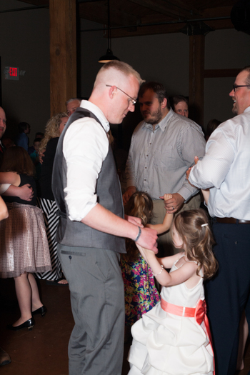 Other fathers are invited to dance with their daughters.