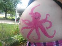 #59 Fograt, Wooster, Elopus or Marge Simpson tummy-art. The “tummy” canvas in question must be that of a woman who is at least 7 months pregnant.